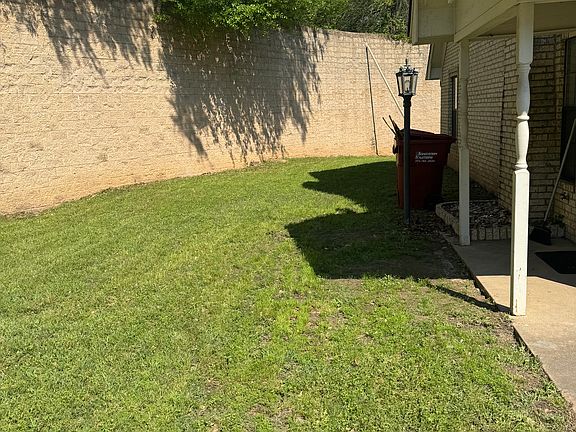 View of side yard from the front yard