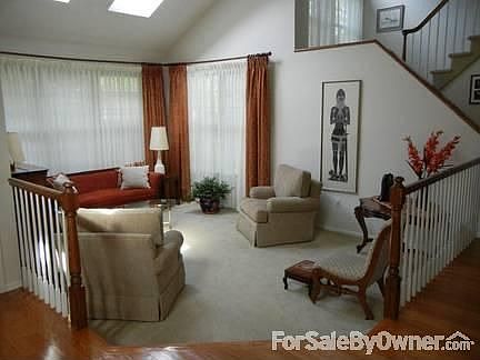 Formal Living Room : Bright Living Room area with cathedral ceiling and two skylights.