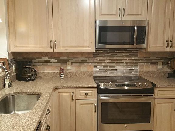 Brand New Kitchen with Quartz counter and maple cabinets!