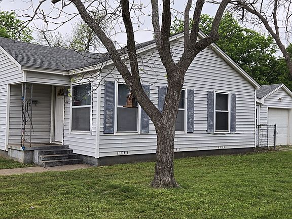 Pecan trees on side of house.