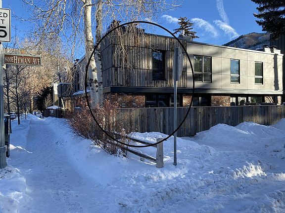 Deck faces sun, Aspen Mtn & Hyman Ave.