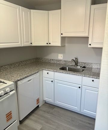 Kitchen View Granite Counter Tops New Cabinetry with Dishwasher