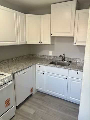Kitchen View Granite Counter Tops New Cabinetry with Dishwasher