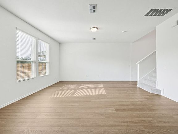 Spacious gathering room with large windows