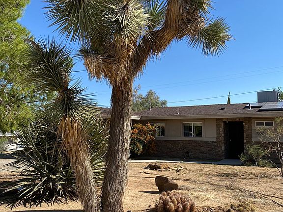 Exterior of front of home. Solar system on roof.