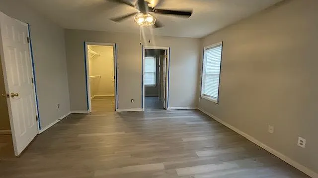 Master Bedroom overlooking Full Bath suite with linen closet and walk-in closet.