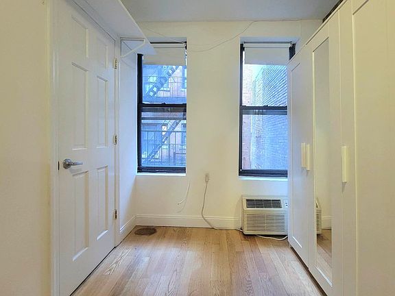 5th image of 225 E 5th St APT 3B