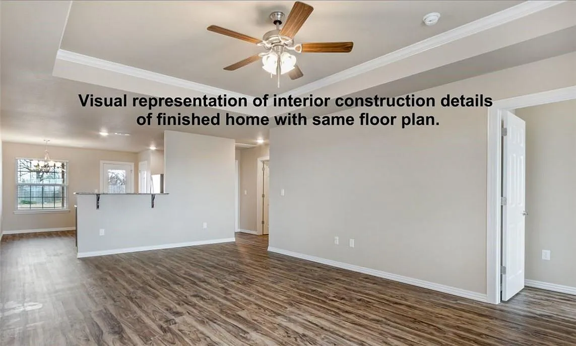 Living room and kitchen without furniture. - 2109 Brown Bear Ln