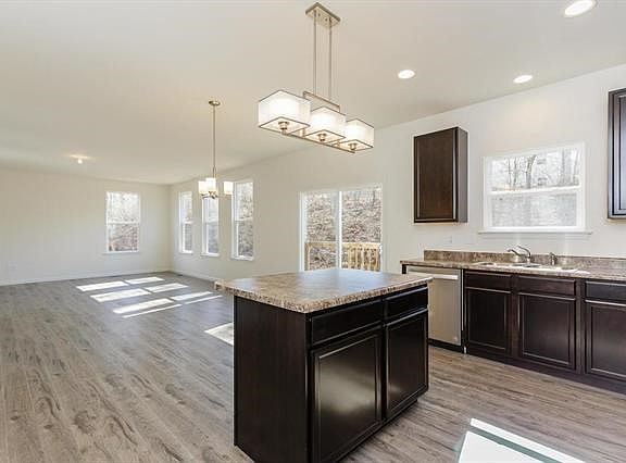 Center Island in Kitchen with view into Breakfast Room and Great Room