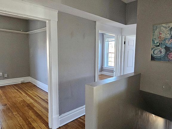 Entry Landing with living room, bedroom and office (clockwise)