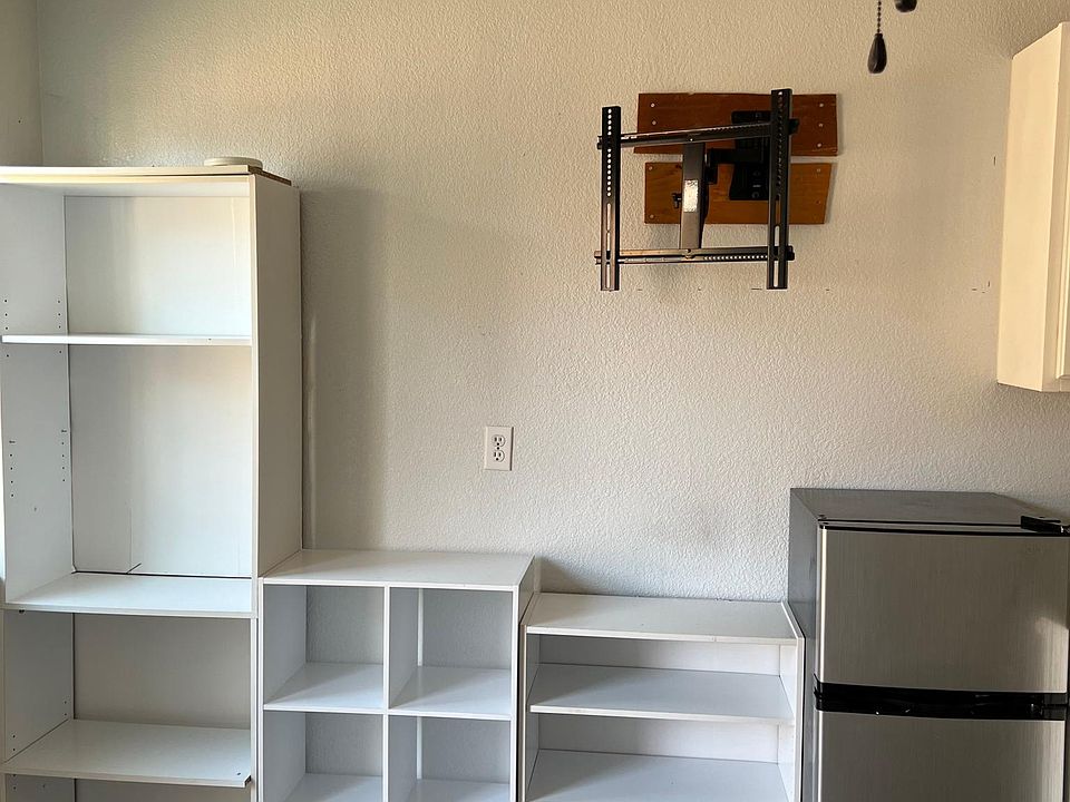 tv stand on the wall already , shelves fitted in for your storage