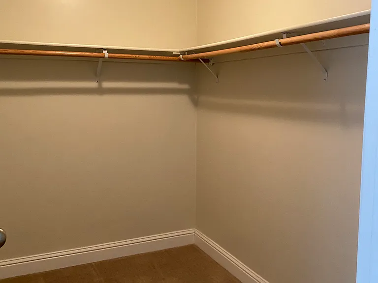 Walk-In Closet in Primary Bedroom