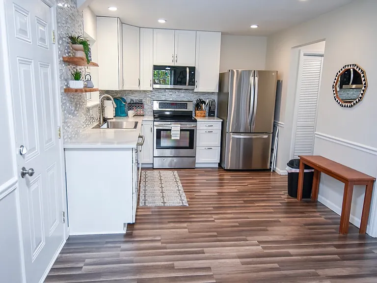 Renovated kitchen in 2026, quartz counters and new appliances