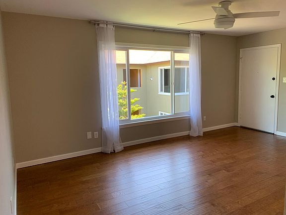 Living room with large double pane windows