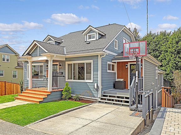 Front of home, parking pad w/EV Charger>