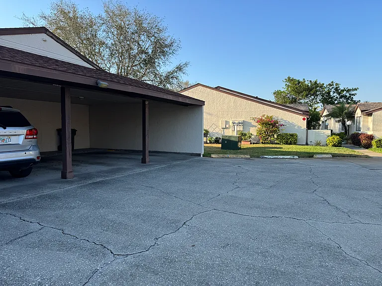 Coverd car port for unit