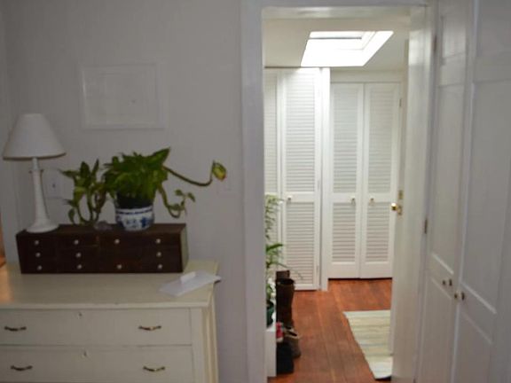 Entryway with skylight and closet