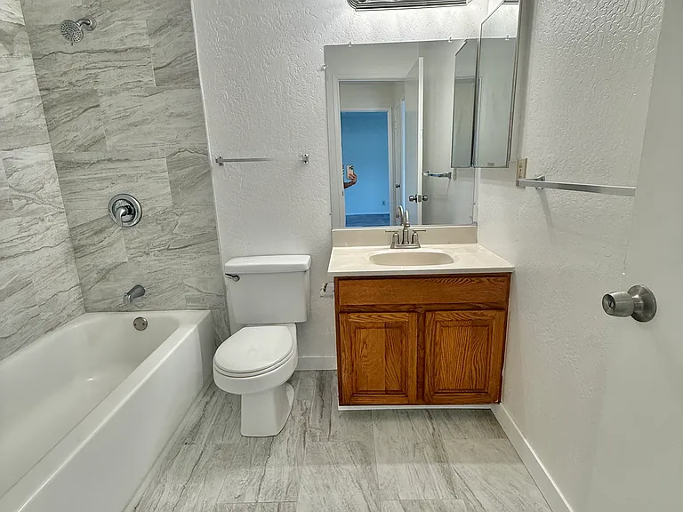Upstairs Full Bath. Glass shower door being installed ASAP prior to tenant moving in.
