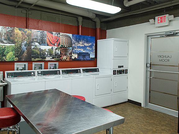 Laundry room with seating area