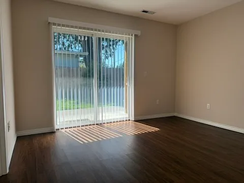 Master Bedroom with Sliding door to fenced backyard