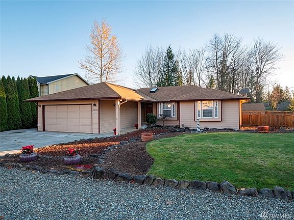 An easy care flat yard with 3 car drive way and RV/Boat parking. Freshly cleaned roof and gutters. Hardiplank siding and paint have been well maintained.