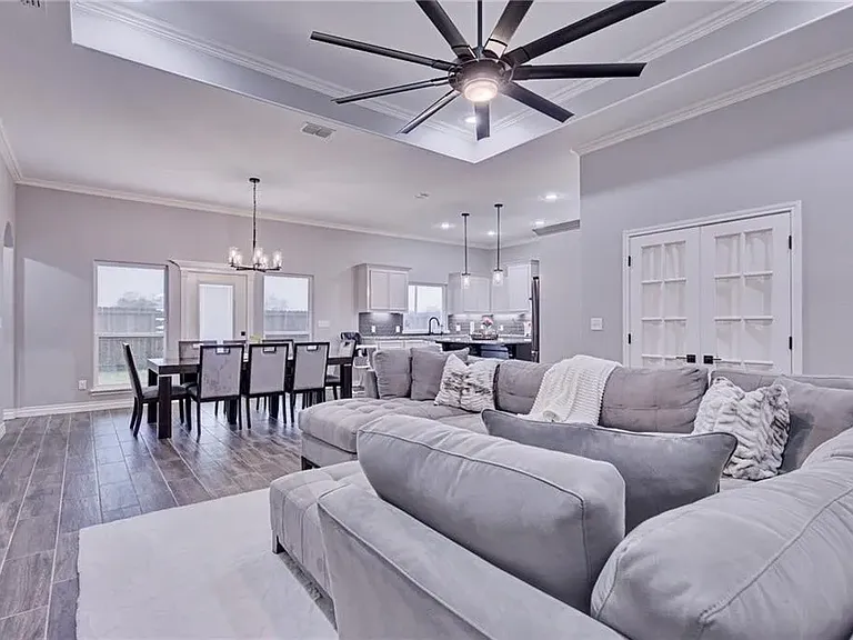 Living room shown from an additional angle, highlighting the open-concept layout.
