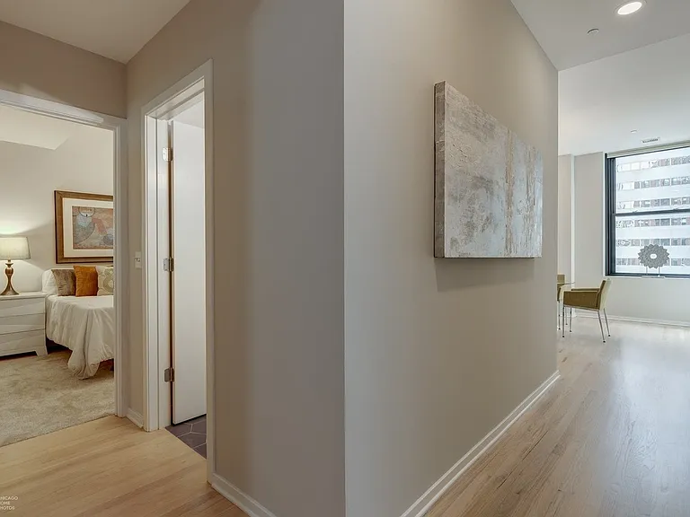 Foyer hallway (left - second bed and full bath; right - dining area)