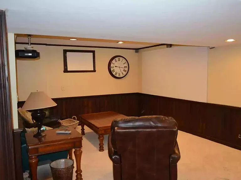 Theater area with 9'
 screen perfect for video games and virtual reality equipment