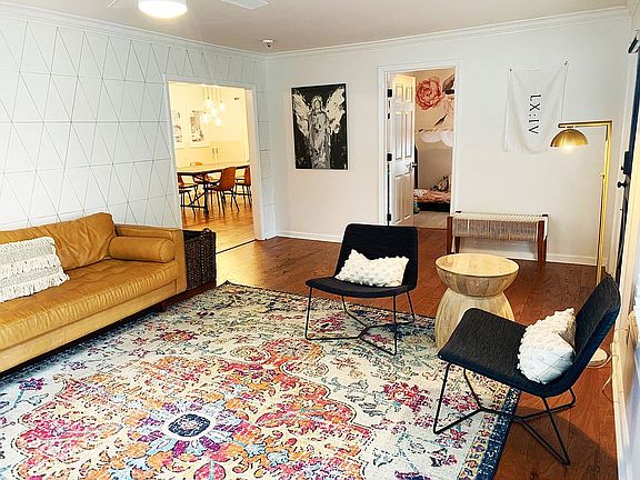 Living room opens to dining