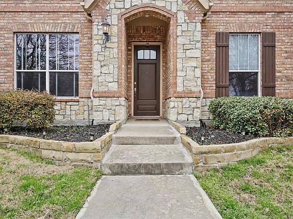 Gorgeous brick and stone exterior for curb appeal plus!