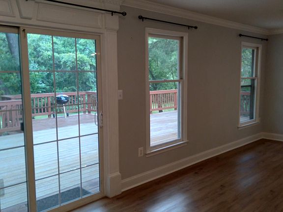 Main living area and dining area, very bright and sunny, opens out to spacious deck area!