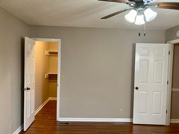 Master bedroom with walk in closet. All wall and trim painted to as new.