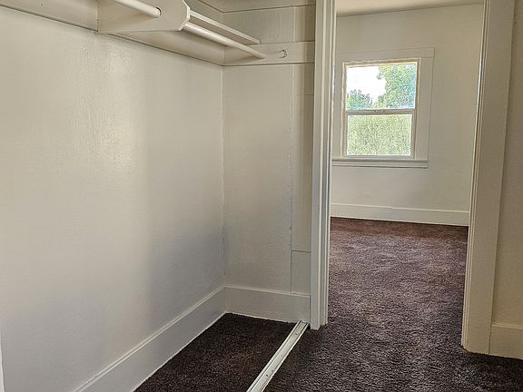 Hallway connecting Living Room space to Bedroom