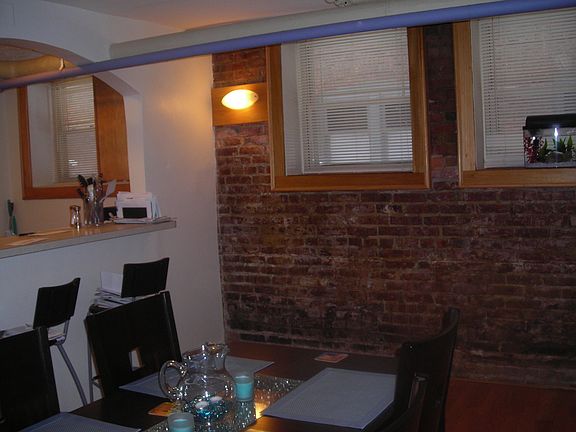 Dining Room exposed brick wall