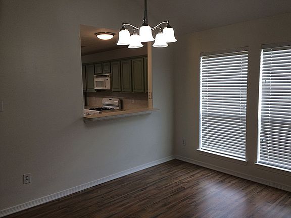 LIVING LOOKING INTO KITCHEN 