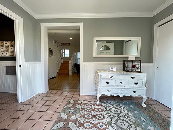 Foyer with bathroom to the left