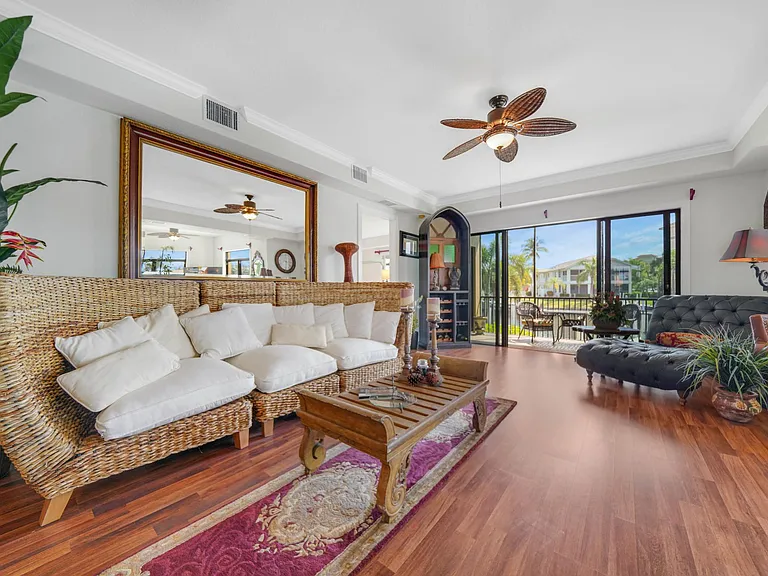 Living Room with Lanai through sliding glass doors.