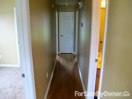 Hallway from Living Room
						:
						Bathroom and Master bedroom on right, 2 bedrooms on left, linen closet at end.