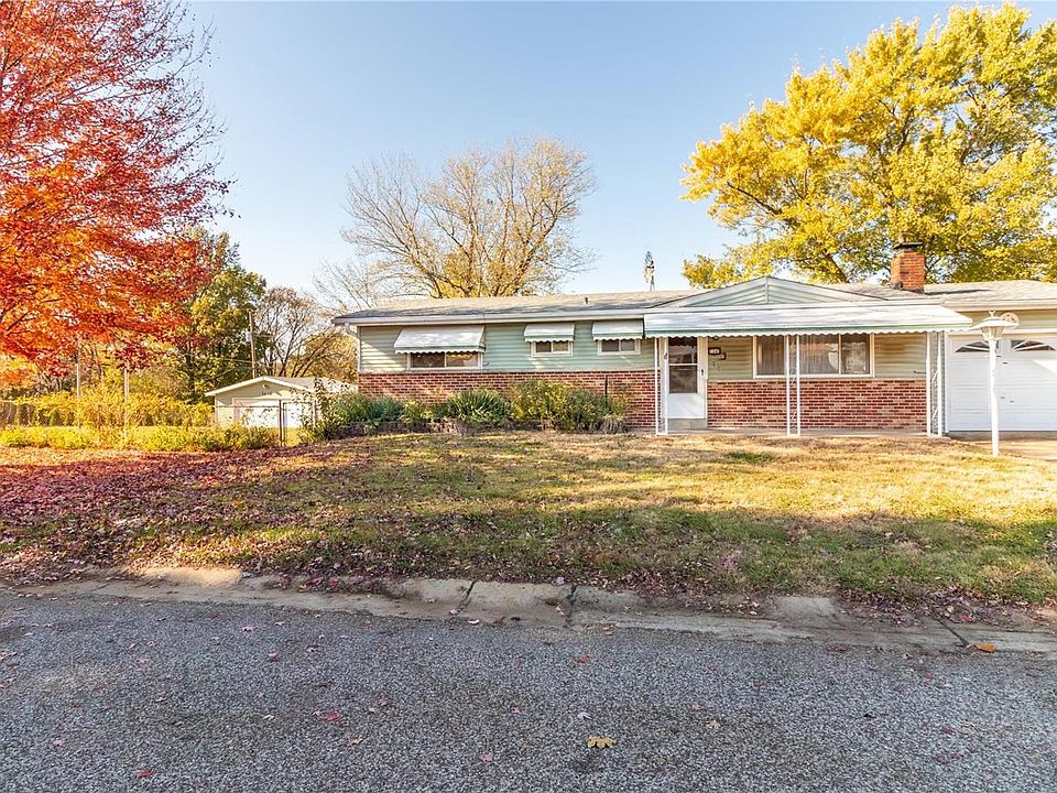 Huge lot with detached garage to the left
