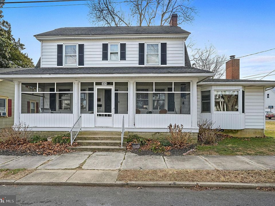 1st image of 104 E 3rd St