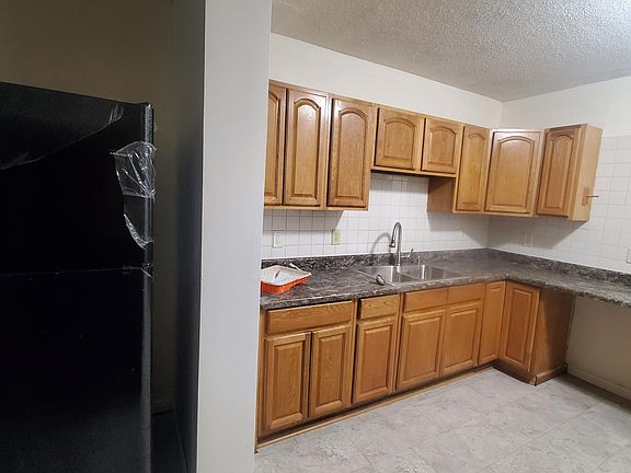 Kitchen with new appliances, floors, counter tops