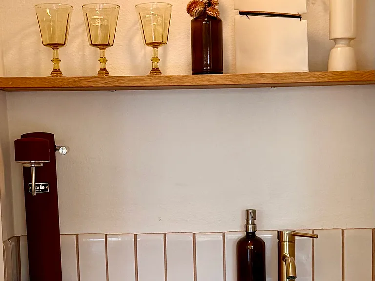 Wet bar with mini refrigerator, sink with filtered water