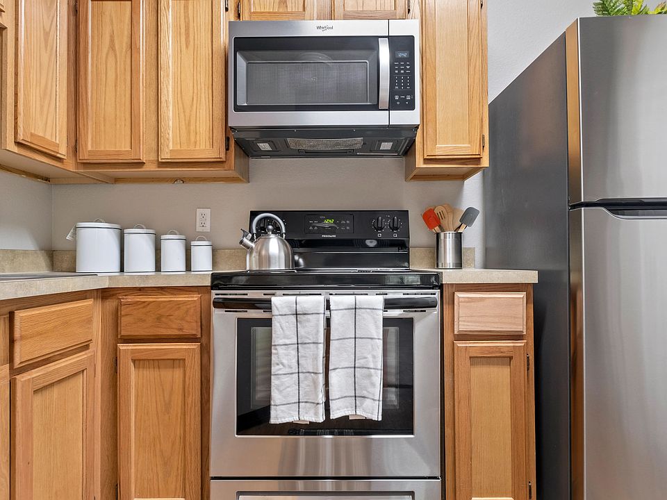 Unleash your inner chef in this fully-appointed kitchen. A symphony of appliances awaits your culinary masterpiece.
