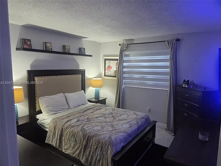 4265 NW South Tamiami Canal Dr #1-208 — Photo 17