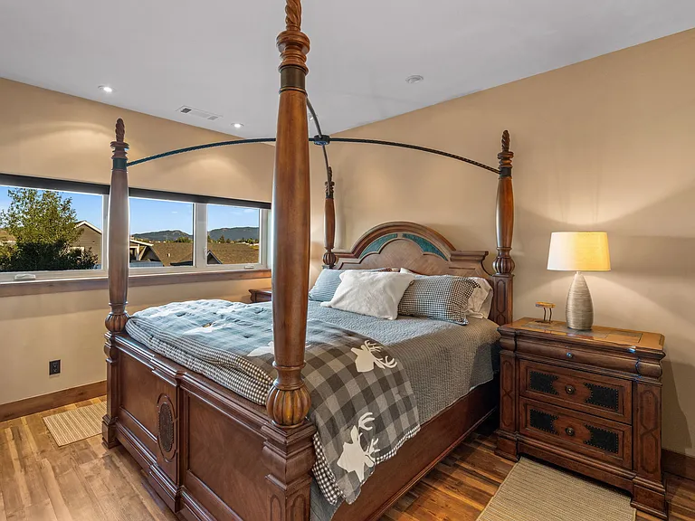 King guest room with walk-in closet and Serta Black mattress.