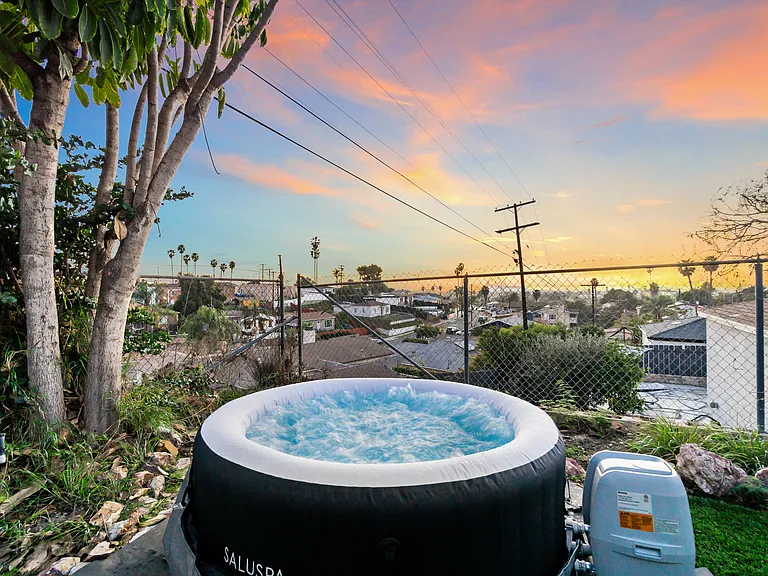 Relax in the hot tub with a stunning skyline view.
