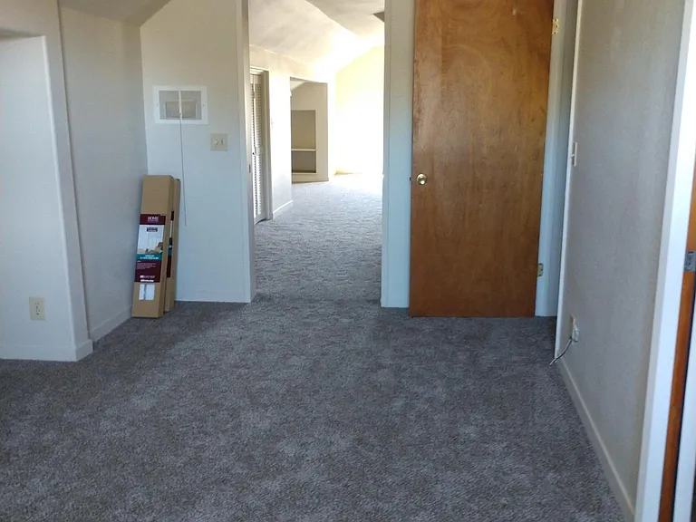 Looking inno the kitchen from the bedroom