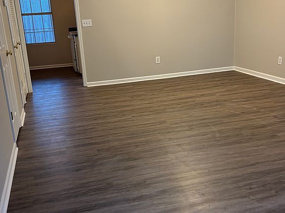 Living Room facing kitchen, from front of unit.