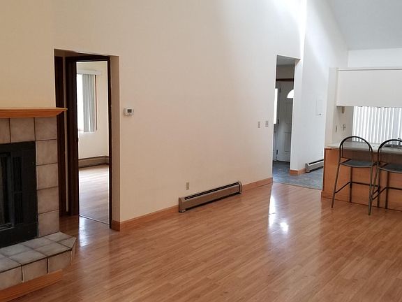 Living Room Looking Towards Kitchen and Entry