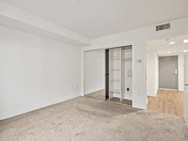 Bedroom with Closet with Shelving